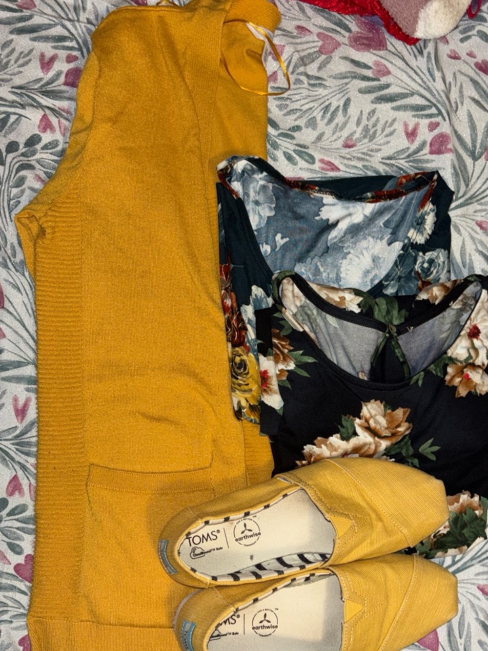 Long sleeve cardigan with two shirts and a pair of Tom’s to match